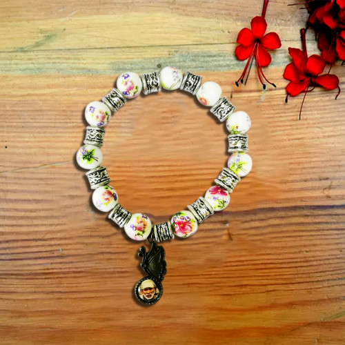 Shri Sai - Ceramic flowers printed  bracelet with metal pendant