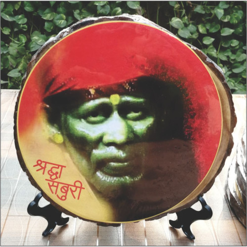 Tree Slice With Sai Baba Picture