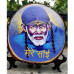 Tree Slice with Sai Baba Picture